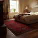 How to Decorate a Bedroom With Red Carpet